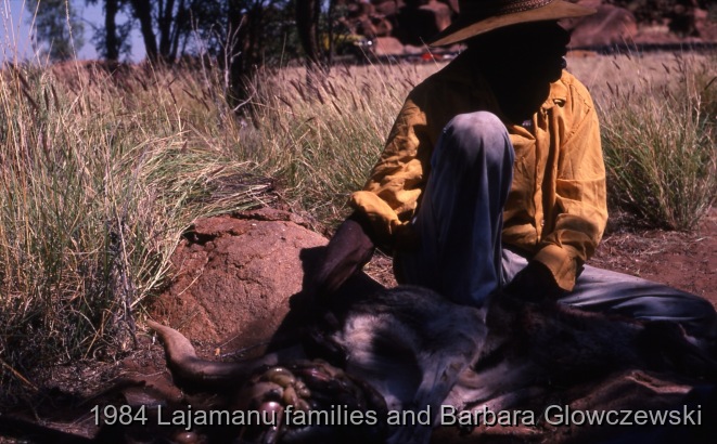 Granites 1 / Janganpa Jungarrayi cleaning kangaroo; Travelling and camping  with the Menzies family / Barbara Glowczewski / Granites, Tanami and Lima outstation