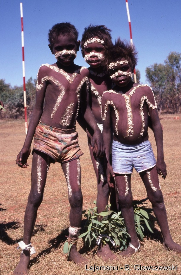 School 2 / Three boys painted with Warlu (Fire) designs for Jurntu purpala using wild cotton stuck to their skin like men do.  / Barbara Glowczewski / School, Lajamanu, Tanami Desert, Central Australia