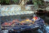 Temple de Budhanilkantha : statue de Vishnu couché. 