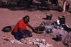  Biddy Nungarrayi Robertson (Jimidja Jungarrayi's sister) cooks the meat