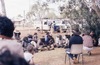 Meeting in the park, in front of the shop