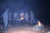 Yarkinpirri fire dance, boys are fed and women exchange fire stick