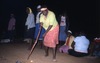 Yarkinpirri fire dance, boys are fed and women exchange fire stick