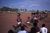 Lajamanu boys dance. Children and adults celebrate the end of School