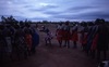 Women dance Jurntu purlapa. Children and adults celebrate the end of School