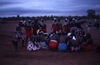 Women dance Jurntu purlapa. Children and adults celebrate the end of School