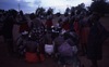 Women dance Jurntu purlapa. Children and adults celebrate the end of School