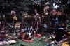 Lajamanu men paint themselves for Jurntu purlapa. Bobbie Payton Japaljarri at the middle. Public performance for NAIDOC