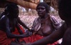 Women get painted for Jurntu purlapa. Public performance for NAIDOC