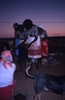 Women painted NGURLU (Seed) dance with yukurrukurru (slates)	