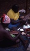 women painting yukurrukurru woman slates