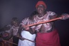 May (Yiripanta) and other Napaljarri and Nungarrayi women dancing with WURPARI painted sticks